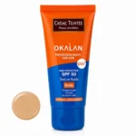نمای کناری کرم ضد آفتاب رنگی صورت اوکالان SPF 50 مدل Dorée مناسب برای پوست حساس حجم 50 میلی لیتر عمق قاب و پروفایل