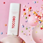 نمای در اتاق کرم ضد آفتاب بدون رنگ توکوبو SPF 50 مدل Vita Tone Up مناسب برای انواع پوست حجم 50 میلی لیتر سبک دیواری و مرجع ان