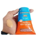 نمای در اتاق کرم ضد آفتاب رنگی صورت اوکالان SPF 50 مدل Dorée مناسب برای پوست حساس حجم 50 میلی لیتر سبک دیواری و مرجع اندازه