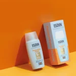 نمای جلو فلوئید ضدآفتاب بدون رنگ ایزدین SPF۵۰ مدل Fusion Water Magic مناسب انواع پوست، حجم ۵۰ میلی لیتر اصل چیدمان صفحه و نشا