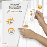 نمای جلو فلوئید ضدآفتاب رنگی ویتالیر، ۵۰ SPF، مدل Vitamin C، مناسب انواع پوست تنالیته رنگ متوسط و حجم ۵۰ میلی لیتر، ضد آب، مح